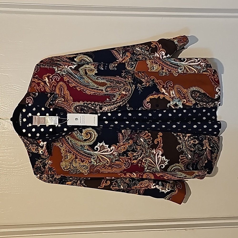 Chicos size 0. REVERSIBLE long sleeve button down shirt. Paisley print and solid